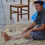 Pescatore con rete da pesca